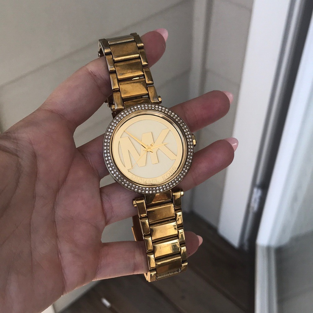 Gold authentic Micheal Korda watch